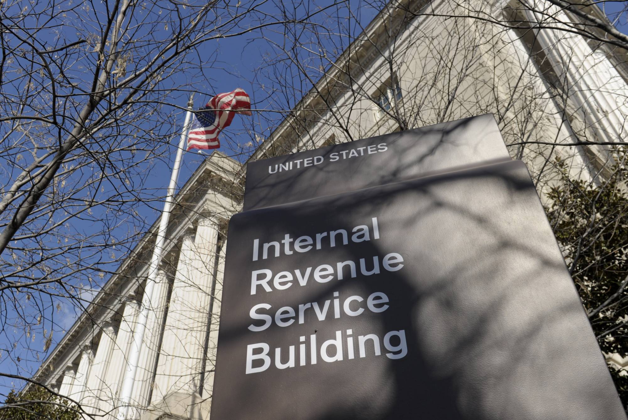 FILE - In this March 22, 2013 file photo, the exterior of the Internal Revenue Service building in Washington. As millions of Americans file their income tax returns, their chances of getting audited by the IRS have rarely been so low. The number of people audited by the IRS last year dropped for the sixth straight year, to just over 1 million. The last time so few people were audited was 2004, when the population was significantly smaller.  (AP Photo/Susan Walsh, File)