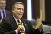 llinois Rep. Mike Bost argues legislation while on the House floor during session at the state Capitol in Springfield Ill.