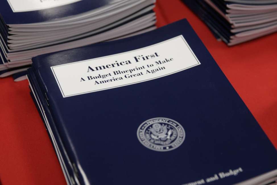 Copies of President Donald Trump's first budget are displayed at the Government Printing Office in Washington, Thursday, March, 16, 2017. Trump unveiled a $1.15 trillion budget on Thursday, a far-reaching overhaul of federal government spending that slashes many domestic programs to finance a significant increase in the military and make a down payment on a U.S.-Mexico border wall.  (AP Photo/J. Scott Applewhite)