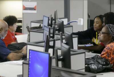 In this Friday, March 10, 2017, photo, job seekers use computers to search for a job at the Texas Workforce Solutions office in Dallas. On Thursday, March 16, 2017, the Labor Department reports on the number of jobless claims the week before. (AP Photo/LM Otero)