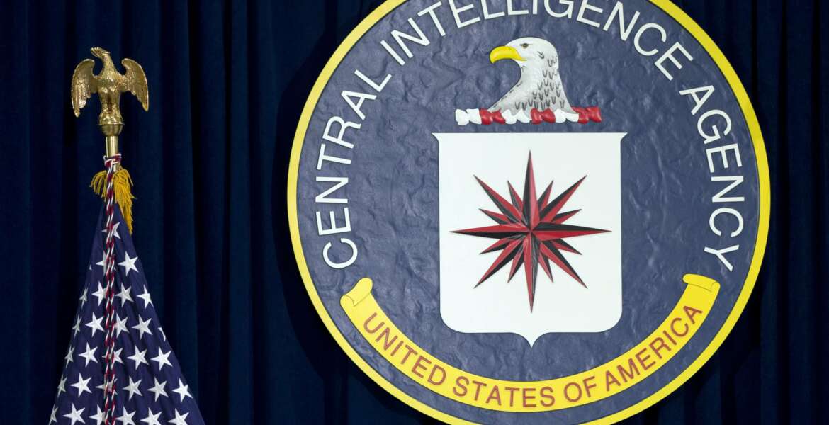 FILE - This April 13, 2016, file photo shows the seal of the Central Intelligence Agency at CIA headquarters in Langley, Va. WikiLeaks’ release of nearly 8,000 documents that purportedly reveal secrets about the CIA’s tools for breaking into computers, cellphones and even smart TVs has given rise to multiple theories about whodunit and why. (AP Photo/Carolyn Kaster, File)