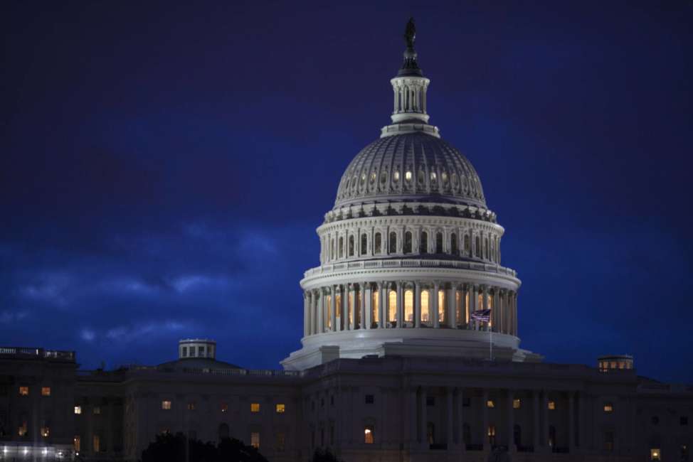 FILE - In this April 4, 2017, file photo, the Capitol is seen at dawn in Washington. Bipartisan bargainers are making progress toward a budget deal to prevent a partial federal shutdown this weekend, a major hurdle overcome when President Donald Trump signaled he would put off his demand that the measure include money to build his border wall with Mexico. (AP Photo/J. Scott Applewhite, File)