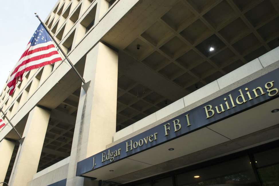 FILE - In this Nov. 2, 2016, file photo, the FBI's J. Edgar Hoover headquarter building in Washington. The FBI has been reviewing the handling of thousands of terror-related tips and leads received over the last three years to make sure they were properly investigated and that no obvious red flags were missed, The Associated Press has learned. (AP Photo/Cliff Owen, File)