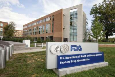 FILE - In this photo taken Oct. 14, 2015, file photo, the Food & Drug Administration campus in Silver Spring, Md. On Thursday, April 20, 2017, the Food and Drug Administration said they are strengthening warnings about the dangers of two types of powerful painkillers due to risks of slowed breathing and death. The FDA said it is requiring makers of prescription versions of the medicines, codeine and tramadol, to change the products' labels to warn against giving them to children under age 12, and to limit use in older children. The FDA also said breastfeeding women shouldn't take them because of possible harm to the baby. (AP Photo/Andrew Harnik, File)