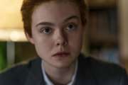 This image released by The Weinstein Company shows Elle Fanning in a scene from "3 Generations."   The transgender drama has been reclassified with a PG-13 rating after the distributor made slight tweaks to the film. The Weinstein Co. said Thursday, April 27, 2017, that it made “some edits to the film as a compromise” after the Motion Picture Association of America gave “3 Generations” an R-rating. (George Nicholis/The Weinstein Company via AP)