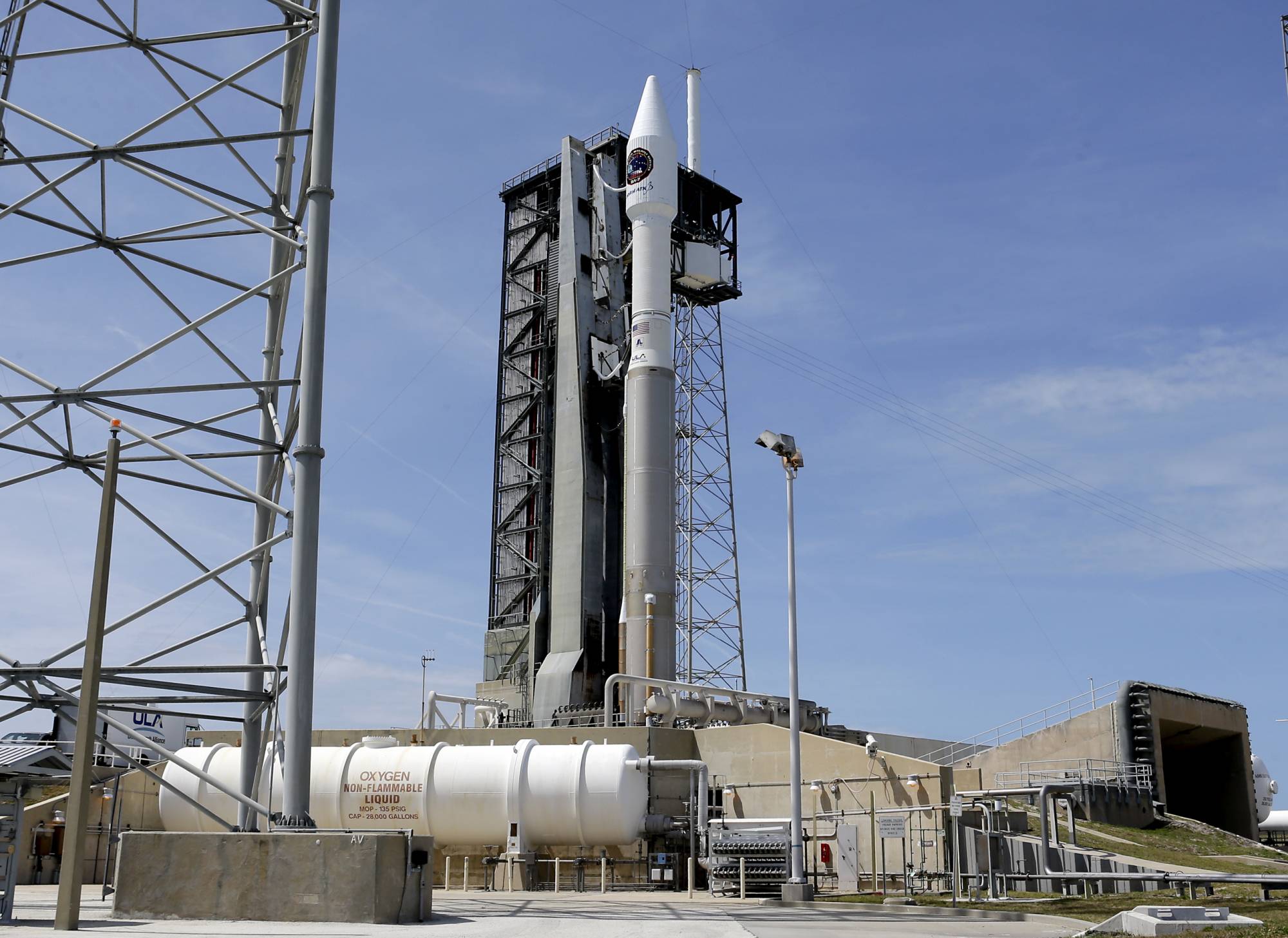 A United Launch Alliance Atlas V rocket that will carry supplies to the International Space Station stands ready at complex 41 at the Cape Canaveral Air Force Station, Monday, April 17, 2017, in Cape Canaveral, Fla. The launch is scheduled for Tuesday morning and for the first time, NASA cameras will provide live 360-degree video of the rocket heading toward space. (AP Photo/John Raoux)