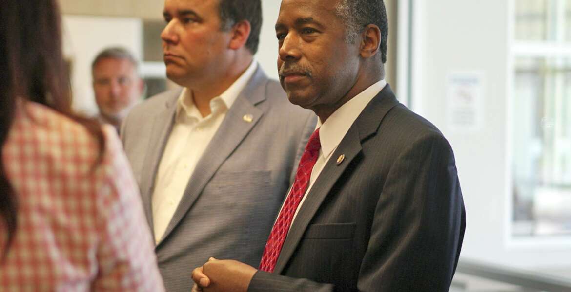 Housing and Urban Development Secretary Ben Carson meets with city and housing officials inside a shelter in Columbus, Ohio, Wednesday, April 26, 2017. Carson said Wednesday he expects to release a policy agenda within the next few months that delivers “bang for the buck,” partly by encouraging more private-sector collaboration. (AP Photo/Dake Kang)