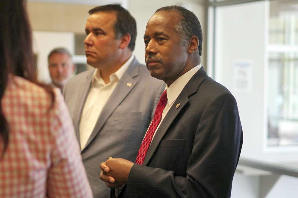 Housing and Urban Development Secretary Ben Carson meets with city and housing officials inside a shelter in Columbus, Ohio, Wednesday, April 26, 2017. Carson said Wednesday he expects to release a policy agenda within the next few months that delivers “bang for the buck,” partly by encouraging more private-sector collaboration. (AP Photo/Dake Kang)