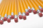 Row of yellow pencils,  close-up of erasers