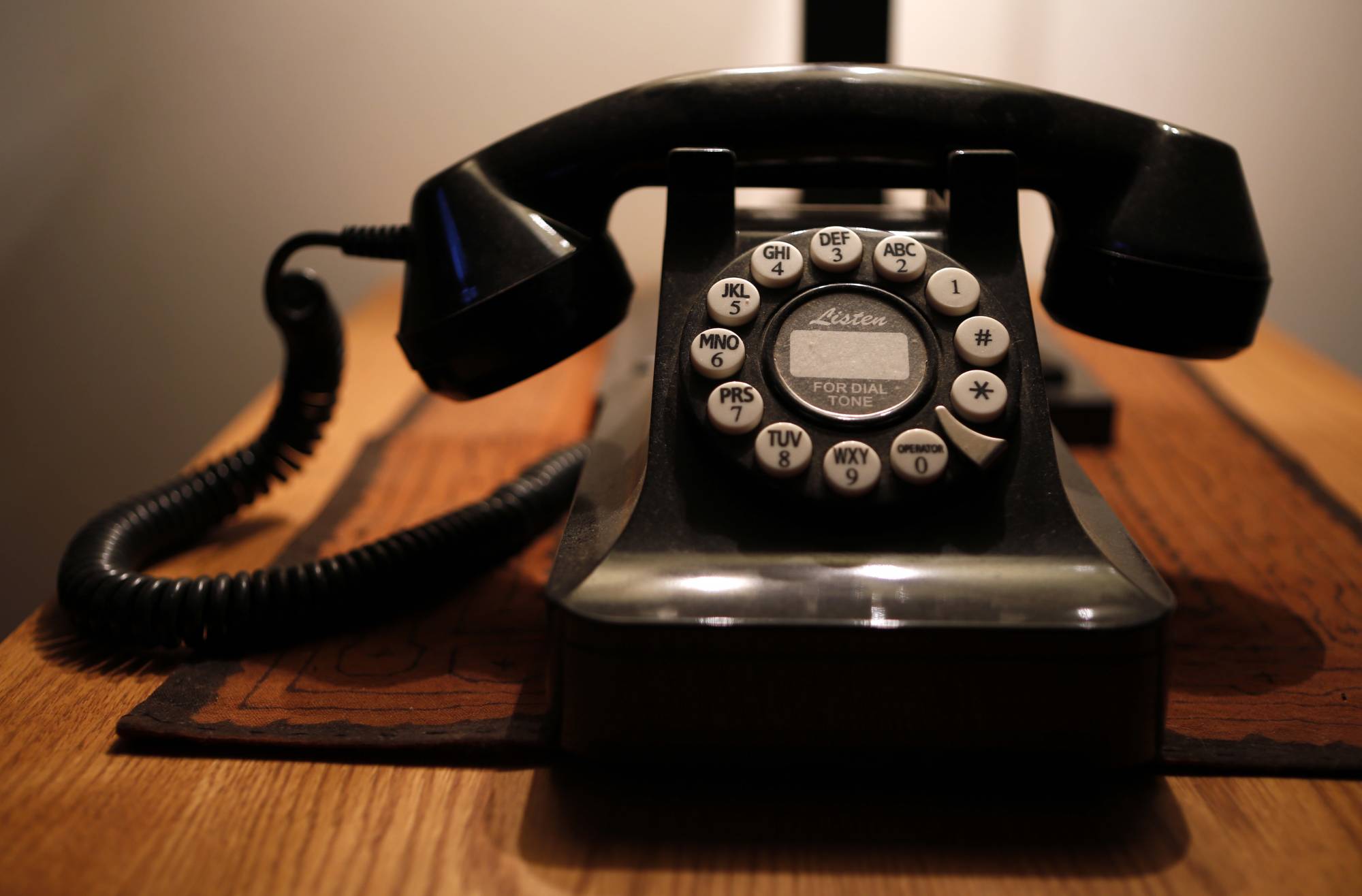 FILE - This Wednesday, April 14, 2016, file photo, shows a push-button landline telephone, in Whitefield, Maine. According to a U.S. government survey released Thursday, May 4, 2017, homes and apartments with only cellphone service exceeded 50 percent for the first time, reaching 50.8 percent for the last six months of 2016. On the flip side, 45.9 percent of U.S. households still have landline phones, including newer internet-based services common with cable TV and internet packages, while the remaining households have no phone service at all. More than 39 percent of U.S. households have both landline and cellphone service. (AP Photo/Robert F. Bukaty, File)