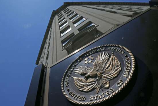 FILE - In this June 21, 2013 file photo, the Veterans Affairs Department in Washington. Federal authorities have launched dozens of new criminal investigations into possible opioid and other drug theft by employees at Department of Veterans Affairs hospitals, a sign the problem isn't going away despite new prevention efforts. Data obtained by The Associated Press show 36 cases opened by the VA inspector general's office from Oct. 1 through May 19. (AP Photo/Charles Dharapak, File)
