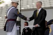 Secretary of Defense James Mattis hands a graduating cadet his diploma while congratulating him during commencement ceremonies at the United States Military Academy, Saturday, May 27, 2017, in West Point, N.Y. Nine Hundred and thirty six cadets received their diplomas, most of whom will be commissioned as second lieutenants in the army. (AP Photo/Julie Jacobson)