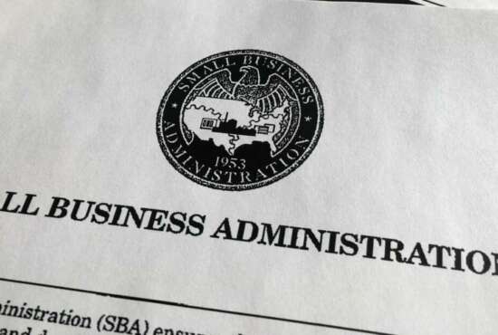 A portion of President Donald Trump's first proposed budget, focusing on the Small Business Administration, and released by the Office of Management and Budget, is photographed in Washington, Wednesday, March 15, 2017. (AP Photo/Jon Elswick)