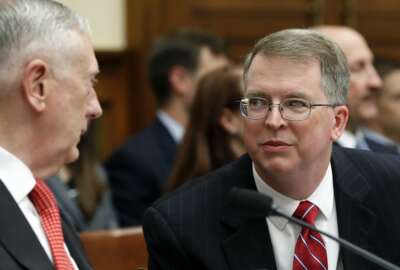 Defense Secretary Jim Mattis, left, and Defense Under Secretary and Chief Financial Office David Norquist, talk before a House Armed Services Committee hearing on the defense budget for the 2018 fiscal year, which begins Oct. 1, on Capitol Hill, Monday, June 12, 2017, in Washington. (AP Photo/Alex Brandon)