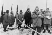 This Nov. 20, 1942, photo provided by the U.S. Army Corps of Engineers Office of History, shows opening ceremonies of the ALCAN Highway in the Yukon at Soldier's Summit, Alaska. Nearly 4,000 segregated black soldiers helped build the highway across Alaska and Canada during World War II, a contribution largely ignored for decades but drawing attention as the 75th anniversary approaches. (U.S. Army Corps of Engineers Office of History via AP)