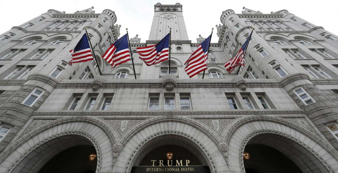 FILE - The Trump International Hotel at 1100 Pennsylvania Avenue NW, is seen Wednesday, Dec. 21, 2016 in Washington.   President Donald Trump keeps taking time out from governing to run for re-election.  On Wednesday night, he’ll attend his first 2020 campaign fundraiser, at his Washington hotel. He’s already spent five evenings at political rallies, always in front of an audience of thousands of fans who are selected by his campaign aides.  (AP Photo/Alex Brandon)