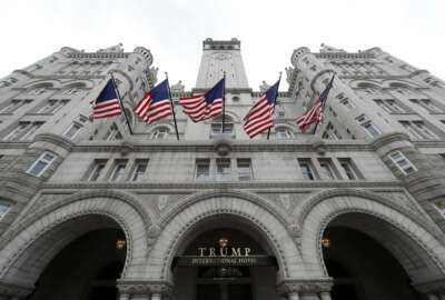 FILE - The Trump International Hotel at 1100 Pennsylvania Avenue NW, is seen Wednesday, Dec. 21, 2016 in Washington.   President Donald Trump keeps taking time out from governing to run for re-election.  On Wednesday night, he’ll attend his first 2020 campaign fundraiser, at his Washington hotel. He’s already spent five evenings at political rallies, always in front of an audience of thousands of fans who are selected by his campaign aides.  (AP Photo/Alex Brandon)