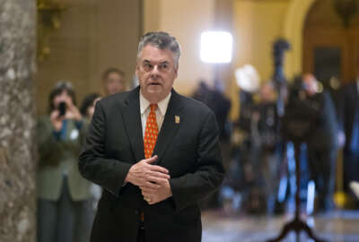 Rep. Peter King, R-N.Y. walks to a meeting with House Speaker John Boehner Ohio, on Capitol Hill in Washington, Wednesday, Jan. 2, 2013. King, the chairman of the House Homeland Security Committee, was infuriated when the Republican leadership decided late New Year's Day to not vote on aid for the victims of Superstorm Sandy. (AP Photo/J. Scott Applewhite)