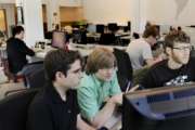 FILE - In this July 29, 2011, file photo, from left, Aaron Parecki, Patrick Arlt, and Kyle Drake work in the Portland Incubator Experiment offices, in the Pearl District in Portland. The Portland Incubator Experiment, more commonly known as PIE, is ad firm Wieden+Kennedy's effort to nurture startups. It’s not always easy to transition from a corporate environment to running your own shop. But you can take certain steps before quitting your current job to make sure you’re ready for the unique pressures of entrepreneurship. (Ross William Hamilton/The Oregonian via AP, File)