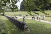 FILE- In this June 3, 2009, file photo a group takes a tour of the Antietam National Battlefield during a leadership training seminar in Sharpsburg, Md. Secretary of the Interior Ryan Zinke announced Wednesday, July 5, 2017, that President Donald Trump’s salary, which he promised to give away, will go toward two restoration projects at Antietam National Battlefield. (AP Photo/Rob Carr, File)