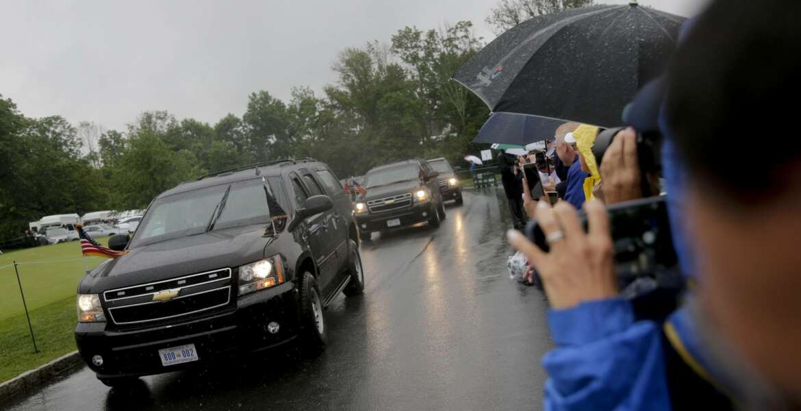 President Donald Trump's motorcade arrives at Trump National Golf Club during the second round of the U.S. Women's Open Golf tournament Friday, July 14, 2017, in Bedminster, N.J. (AP Photo/Seth Wenig)