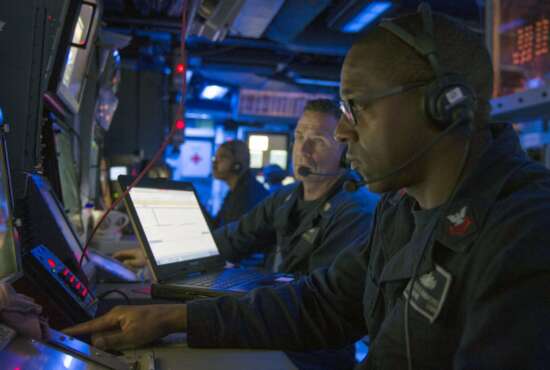 SOUTH PACIFIC (July 9, 2017) Operations Specialist 1st Class Charles Hammond, from Kansas City, Missouri, monitors tracks aboard Arleigh Burke-class guided-missile destroyer USS Sterett (DDG 104) during an air defense exercise comprised of Sterett, amphibious assault ship USS Bonhomme Richard (LHD 6), amphibious transport dock USS Green Bay (LPD 20), amphibious dock landing ship USS Ashland (LSD 48), Royal Australian Navy frigate helicopter HMAS Ballarat (FFH 155), Royal Australian Navy guided missile frigate HMAS Darwin (FFG 04), and Royal Australian Navy frigate helicopter HMAS Toowoomba (FFH 156) as part of Talisman Saber 17. Sterett, part of a combined U.S.-Australia-New Zealand expeditionary strike group (ESG), is undergoing a series of scenarios that will increase proficiencies defending the ESG against blue-water threats so amphibious forces can launch Marine forces ashore in the littorals. Talisman Saber is a biennial U.S.-Australia bilateral exercise held off the coast of Australia meant to achieve interoperability and strengthen the U.S.-Australia alliance. (U.S. Navy photo by Mass Communication Specialist 1st Class Byron C. Linder/Released)170709-N-ZW825-895
