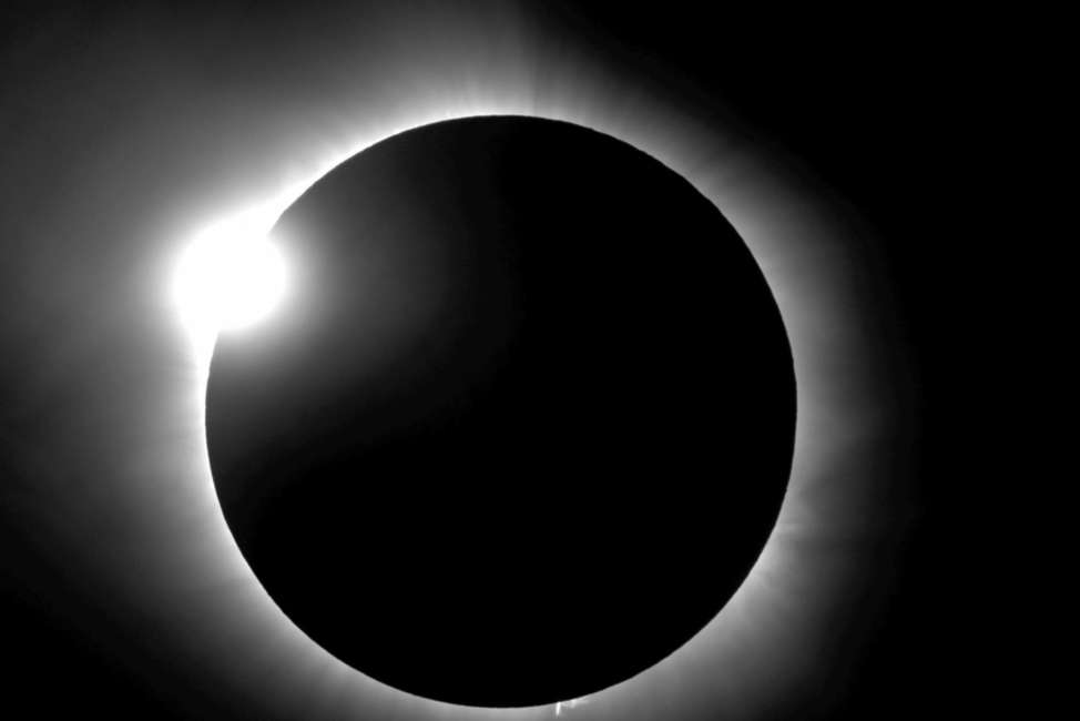 This photo provided by Bob Baer and Sarah Kovac, participants in the Citizen CATE Experiment, shows a "diamond ring" shape during the 2016 total solar eclipse in Indonesia. For the 2017 eclipse over the United States, the National Science Foundation-funded movie project nicknamed Citizen CATE will have more than 200 volunteers trained and given special small telescopes and tripods to observe the sun at 68 locations in the exact same way. The thousands of images from the citizen-scientists will be combined for a movie of the usually hard-to-see sun’s edge. (R. Baer, S. Kovac/Citizen CATE Experiment via AP)