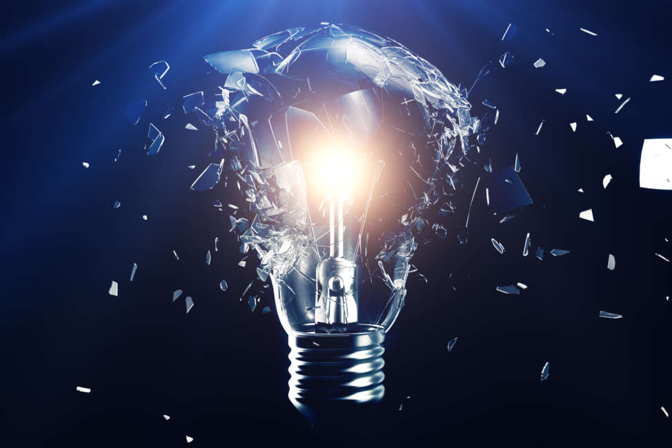 Exploding light bulb on a blue background, with concept creative thinking and innovative solutions, 3D rendering