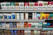 Cigarettes are displayed on a shelf, Monday, Aug. 28, 2017, in New York. Mayor Bill de Blasio is expected to sign legislation raising the legal minimum price for a pack of cigarettes to $13. The hike from $10.50 further cements the city's claim on having among the most expensive cigarettes in the country. (AP Photo/Mark Lennihan)