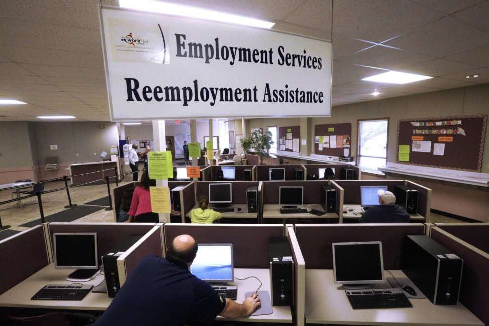 FILE - This Thursday, Sept. 29, 2016, file photo, shows the Illinois Department of Employment Security office in Springfield, Ill. On Friday, Aug. 18, 2017, the Labor Department reports on state unemployment rates for July. (AP Photo/Seth Perlman, File)