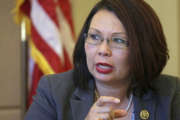 FILE - In this July 31, 2015 file photo, U.S. Rep. Tammy Duckworth D-Ill., appears before the Chicago City Council's finance committee in Chicago. Duckworth, a candidate for the U.S. Senate, faces incumbent Republican Sen. Mark Kirk in the November election. Both Duckworth and Kirk are making national security a key issue in their campaigns. (AP Photo/M. Spencer Green, File)