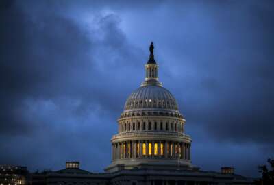 The Capitol is seen at dawn as overnight storm clouds pass, in Washington, Tuesday, Oct. 24, 2017. (AP Photo/J. Scott Applewhite)