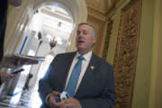 Rep. Mark Meadows, R-N.C., chairman of the conservative House Freedom Caucus, speaks with reporters as the House prepared to vote on relief for hurricane victims at the Capitol in Washington, Friday, Sept. 8, 2017. (AP Photo/J. Scott Applewhite)