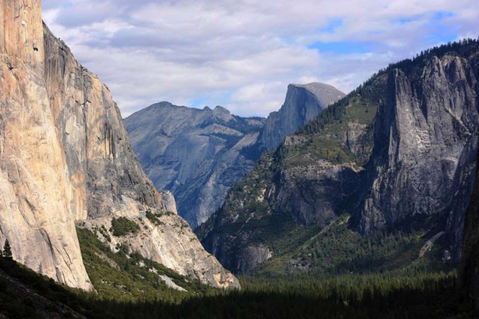 FILE - This Oct. 2, 2013, file photo, shows a view seen on the way to Glacier Point trail in the Yosemite National Park, Calif. The National Park Service is floating a proposal to increase entrance fees at 17 of its most popular sites next year. (AP Photo/Tammy Webber, File)