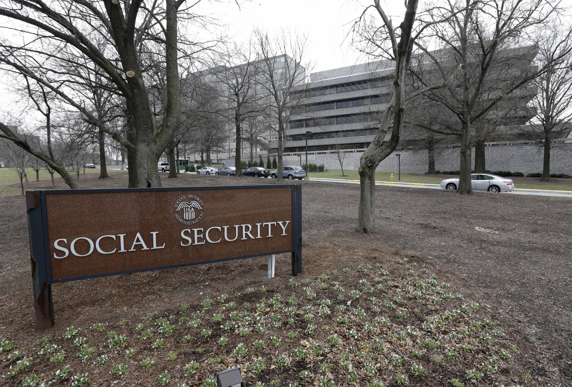 FILE - In this Jan. 11, 2013 file photo, the Social Security Administration's main campus is seen in Woodlawn, Md. Millions of Social Security recipients and other retirees can expect another small increase in benefits in 2018. Preliminary figures suggest an increase of around 2 percent. That would mean an extra $25 a month for the average beneficiary. The Social Security Administration is scheduled to announce the cost-of-living adjustment on Oct. 13, 2017.(AP Photo/Patrick Semansky, File)