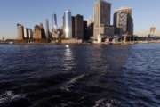 Water from New York Harbor surrounds the southern tip of New York's Manhattan borough on Tuesday, Oct. 17, 2017, seen from aboard a Staten Island Ferry. Superstorm Sandy roared ashore five years ago, Monday, Oct. 29, 2012, devastating the coastlines of New Jersey, New York and parts of Connecticut and becoming one of the costliest storms in U.S. history. (AP Photo/Seth Wenig)