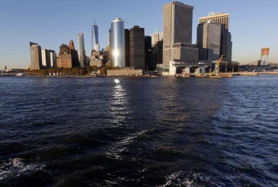 Water from New York Harbor surrounds the southern tip of New York's Manhattan borough on Tuesday, Oct. 17, 2017, seen from aboard a Staten Island Ferry. Superstorm Sandy roared ashore five years ago, Monday, Oct. 29, 2012, devastating the coastlines of New Jersey, New York and parts of Connecticut and becoming one of the costliest storms in U.S. history. (AP Photo/Seth Wenig)