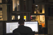 A computer forensic examiner looks for evidence on hard drives at the Department of Defense Cyber Crime Center in Linthicum, Md., Thursday, Aug. 11, 2011. Hackers and hostile nations are launching increasingly sophisticated cyberattacks against U.S. defense contractors. And the Pentagon is extending a program to help protect its prime suppliers, while serving as a possible model for other government agencies. Pentagon analysts are investigating a growing number of cases involving the mishandling or removal of classified data from military and corporate systems. Defense officials say intrusions into defense networks are now close to 30 percent of the Pentagon's Cyber Crime Center's workload. (AP Photo/Cliff Owen)