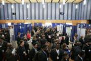 Applicants lined up throughout the civic center floor to interview and talk with federal agencies about potential IT and cyber positions. 