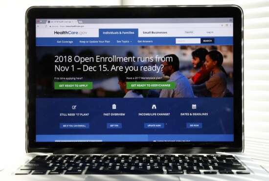 In this Oct. 18, 2017 photo, the Healthcare.gov website is seen on a computer screen in Washington. Consumers are getting the word that taxpayer-subsidized health plans are widely available for next year for no monthly premium, and marketing companies say they’re starting to see an impact on sign-ups. (AP Photo/Alex Brandon)