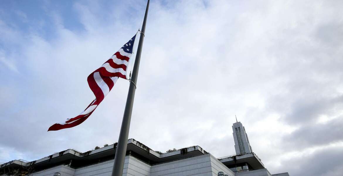 The U.S. flag flies at half-staff during a public viewing of Thomas S. Monson, President of The Church of Jesus Christ of Latter-day Saints  at the LDS Conference Center in Salt Lake City, Utah, Thursday, Jan. 11, 2018. Monson spent more than five decades serving in top church leadership councils, making him a well-known face and personality to multiple generations of Mormons. 
He died on Jan. 2 at the age of 90.  (Kristin Murphy/Deseret News via AP)