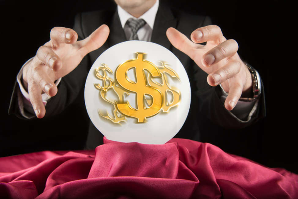 Fortune teller businessman, sees the dollar in a crystal ball