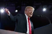 President Donald Trump delivers remarks to the Conservative Political Action Conference, Friday, Feb. 23, 2018, in Oxon Hill, Md. (AP Photo/Evan Vucci)