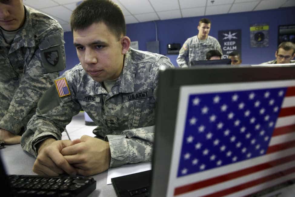 United States Military Academy cadet Dylan Hyde watches data on a computer at the Cyber Research Center at the United States Military Academy in West Point, N.Y., Wednesday, April 9, 2014. The West Point cadets are fending off cyber attacks this week as part of an exercise involving all the service academies. The annual Cyber Defense Exercise requires teams from the five service academies to create computer networks that can withstand attacks from the National Security Agency and the Department of Defense. (AP Photo/Mel Evans)