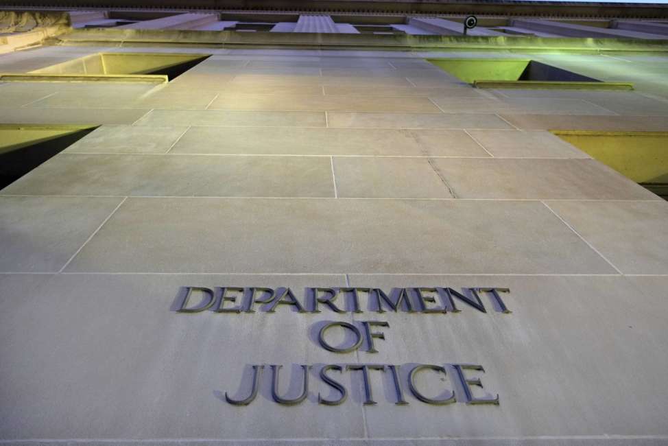 FILE - In this May 14, 2013, file photo, the Department of Justice headquarters building in Washington is photographed early in the morning. The federal government censored, withheld or said it couldn’t find records sought by citizens, journalists and others more often last year than at any point in the past decade, according to an Associated Press analysis of new data. The highest number of requests went to the departments of Homeland Security, Justice, Defense, Health and Human Services, and Agriculture, along with the National Archives and Records Administration and Veterans Administration. (AP Photo/J. David Ake, File)