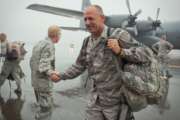 Even the rain cannot stop friends and families from reuniting with Airmen of the 934th Airlift Wing as they return from overseas. The Airmen have been deployed since early 2012 from the Minneapolis-St. Paul International Airport Air Reserve Station, Minn. (Shannon McKay)