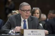 National Background Investigation Bureau Director Charlie Phalen testifies before the Senate Intelligence Committee as lawmakers examine problems and practices of issuing security clearances to government employees, at the Capitol in Washington, Wednesday, March 7, 2018.