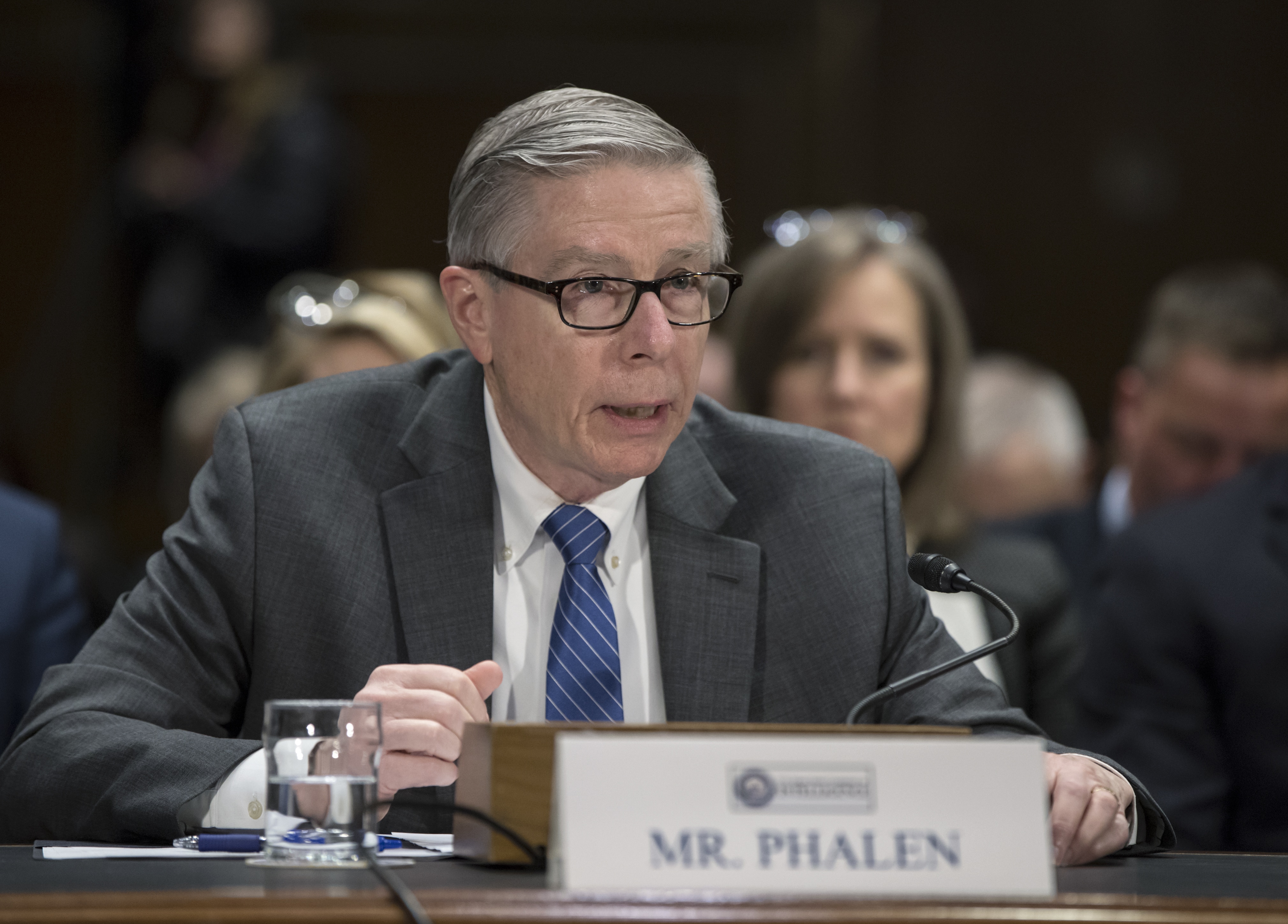 National Background Investigation Bureau Director Charlie Phalen testifies before the Senate Intelligence Committee as lawmakers examine problems and practices of issuing security clearances to government employees, at the Capitol in Washington, Wednesday, March 7, 2018.