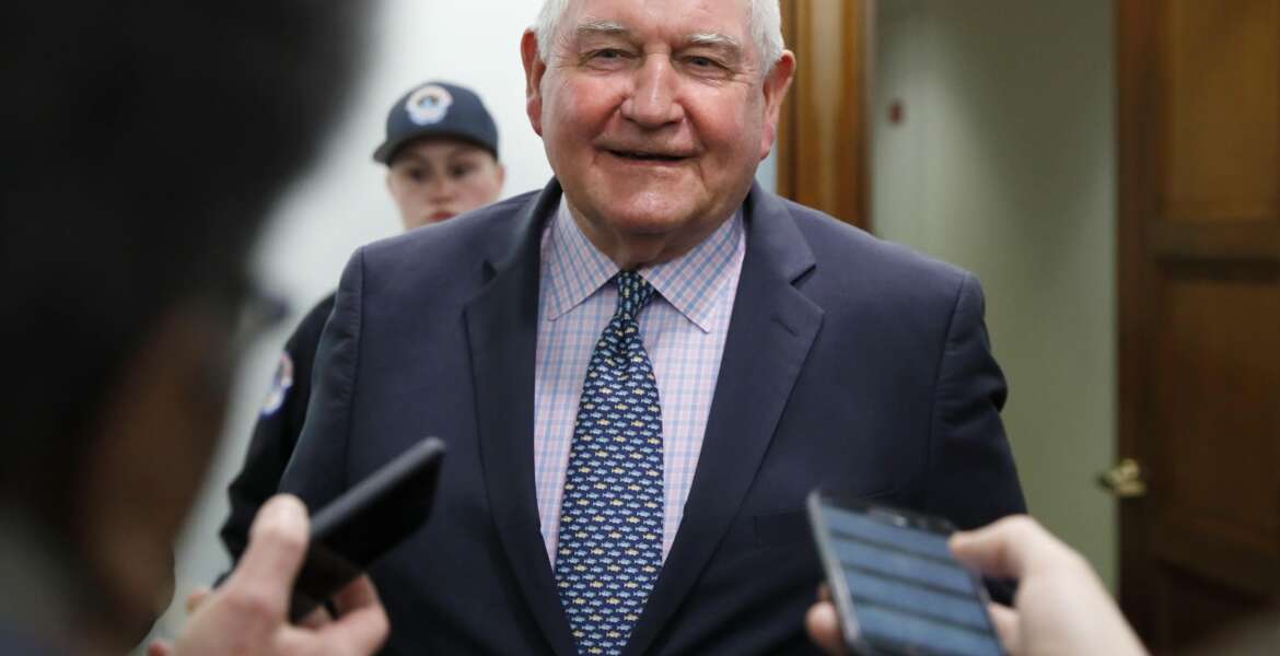 Agriculture Secretary Sonny Perdue speaks with reporters after testifying on the FY2019 USDA budget request April 11, 2018, on Capitol Hill. 