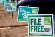 FILE- In this Feb. 14, 2018, file photo, H&amp;R Block signs are displayed in Jackson, Miss. The tax deadline does typically fall on April 15 but that’s a Sunday this year and Monday is Emancipation Day, a Washington D.C. holiday. That means that taxpayers nationwide get a little breathing room and have until Tuesday, April 17, to get the job done. (AP Photo/Rogelio V. Solis, File)